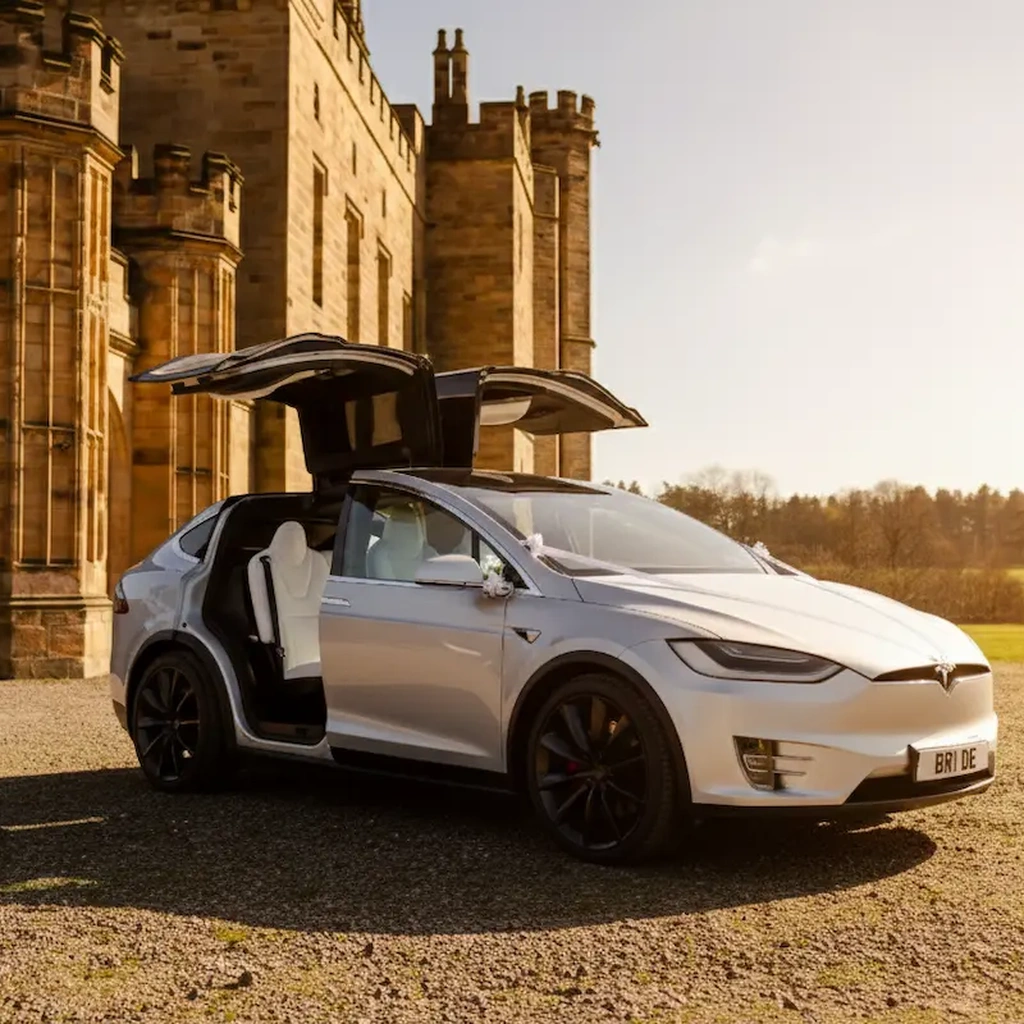 Tesla Model X side view with Falcon Wing doors open
